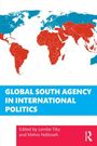"GLOBAL SOUTH AGENCY IN INTERNATIONAL POLITICS" steht über einer Weltkarte in Rot und Blau. Bearbeitet von Lembe Tiky und Melvis Ndiloseh.