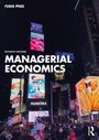 "SEVENTH EDITION MANAGERIAL ECONOMICS. Nachtaufnahme eines belebten Stadtplatzes mit leuchtenden Werbetafeln."