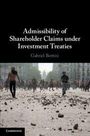 "Admissibility of Shareholder Claims under Investment Treaties" von Gabriel Bottini. Menschen auf einer Straße, beschädigte Umgebung.