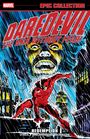 „Daredevil: The Man Without Fear! Redemption.“ Illustration eines Superhelden im Regen mit grimmigem Gesicht im Hintergrund.