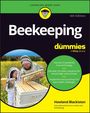 „Beekeeping for dummies“ auf Buchcover. Zwei Imker:innen in Schutzkleidung vor blühendem Feld neben Bienenstock.