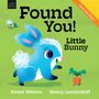 Text: "Found You! Little Bunny", "With felt flaps!", "Sweet Watson", "Nancy Leschnikoff". Illustration: Blauer Hase, Fliege, Karotte.