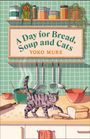 **A Day for Bread, Soup and Cats**. Eine Illustration mit einer grauen Katze auf einer Küchenzeile, umgeben von Brot, Suppe und Küchenutensilien.