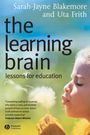 Buchtitel: "The Learning Brain: Lessons for Education." Bild eines Kindes, das auf eine Pusteblume bläst.