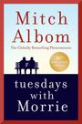 Text: "Mitch Albom, The Globally Bestselling Phenomenon, tuesdays with Morrie, 30th anniversary edition". Silhouette von zwei Personen auf einer Bank.