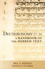 Der Text enthält "Deuteronomy 27-34: A Handbook on the Hebrew Text". Links unten stehen "Bill T. Arnold" und "Paavo N. Tucker". Im Hintergrund sind hebräische Schriftzeichen erkennbar.
