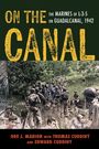 "ON THE CANAL: THE MARINES OF L-3-5 ON GUADALCANAL, 1942" oben. Soldaten im Dschungel, dicht beieinander.
