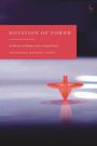 "Rotation of Power: A Theory of Democratic Competition" von Antonios Kouroutakis. Ein rotierender Kreisel auf glatter Oberfläche.