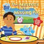 "The Mystery of the Missing Pie" und "Pop-out play pieces on every spread!". Ein Junge, ein blauer Hund, ein Tisch mit Teller.