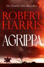 „The Number One Bestseller. ROBERT HARRIS AGRIPPA.“ Ein Reiter auf einem Pferd vor einem dramatisch roten Himmel.