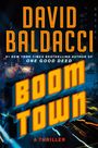"DAVID BALDACCI, BOOM TOWN, A THRILLER; neonfarbenes Stadtkulissen-Design bei Nacht mit leuchtenden Lichtern."