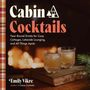 "Cabin Cocktails. Year-Round Drinks for Cozy Cottages, Lakeside Lounging, and All Things Après. Emily Vikre." Ein gemütliches Kaminfeuer.