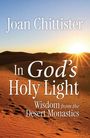 „Joan Chittister. In God's Holy Light: Wisdom from the Desert Monastics.“ Eine Wüstenlandschaft bei Sonnenaufgang.