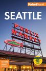 SEATTLE, PUBLIC MARKET, CITY FISH MARKET. Abendhimmel über rotem Marktdach. Fodor's Travel-Logo oben rechts.