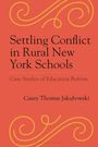 "Settling Conflict in Rural New York Schools" und "Case Studies of Education Reform" von Casey Thomas Jakubowski. Ornamente.