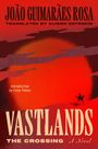 "JOÃO GUIMARÃES ROSA, translated by Alison Entrekin. Introduction by Colm Tóibín. Vastlands: The Crossing, A Novel." Eine rote, weite Landschaft mit Reiter.