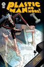 „PLASTIC MAN NO MORE!“ in großen gelben Buchstaben. Eine Comicfigur in rot-schwarzem Anzug verformt sich auf einer Uhr.