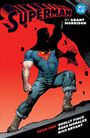 "SUPERMAN", "BY GRANT MORRISON". Illustration von Superman, in Jeans und Stiefeln, mit rotem Umhang vor rotem Hintergrund.