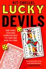 Text: KIT CHELLEL LUCKY DEVILS. Gelbe Würfel, zwei Spielkarten, eine zeigt einen Joker, die andere hat ein Schaltkreismuster.