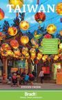 "TAIWAN" ist groß oben zu sehen. Ein Tempel mit bunten Laternen und Menschen, die zusammensitzen, ist im Hintergrund.