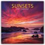 Texte: "SUNSETS 2027 Calendar". Eine atemberaubende Küstenszene bei Sonnenuntergang mit intensiven, leuchtenden Farben.