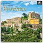 „16-Month 2027 Calendar Provence“ in gelber und schwarzer Schrift. Es zeigt ein malerisches Bergdorf mit historischer Kirche.