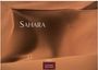 "Sahara" in großen weißen Buchstaben, darunter "2027" und "Casares Edition". Ein Mensch in einer weitläufigen Sanddüne.