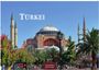 Text: Türkei, 2024, Casares Edition. Im Hintergrund eine historische Moschee mit Minaretten und Palmen im Vordergrund.