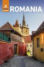 Text: "ROMANIA", "Free eBook", "Rough Guides" (Logo). Bild: Kopfsteinpflasterstraße, bunte Häuser, historischer Turm.