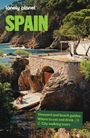 Oben großer Text: "SPAIN". Unten weitere Texte über Weinberge, Strände und Stadtführungen. Küstenlandschaft mit Klippen.
