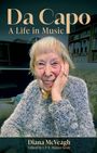 „Da Capo: A Life in Music“. Diana McVeagh. Ein älterer Mensch lächelt, umgeben von Büchern und einem Klavier.