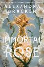 "IMMORTAL ROSE" von Alexandra Bracken. Eine prächtige goldene Rose inmitten von weißen Blüten und Dornenranken.