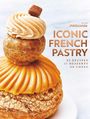 Text: "FOU DE PÂTISSERIE, ICONIC FRENCH PASTRY, 85 RECIPES, 17 DESSERTS, 40 CHEFS." 
Ein kunstvoller Gebäckstapel mit Creme.