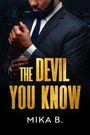 „THE DEVIL YOU KNOW“ in großen, goldenen Buchstaben. Darunter in Weiß „MIKA B.“. Ein Mann im Anzug richtet seine Manschette.