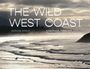 „THE WILD WEST COAST“; Adrian Dorst; Long Beach, Tofino. Ein Surfer im Meer bei dramatischem Himmel.