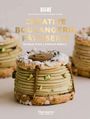 "Creative Boulangerie Pâtisserie: Recipes from a Parisian Bakery." Zartes Gebäck mit Pistazien und Puderzucker verziert.