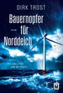 "Bauernopfer für Norddeich", Krimi. 13. Fall für Jan de Fries. Stürmische See mit einem Windrad in der Mitte.