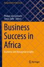 Der Text sagt: "Business Success in Africa: Academic and Managerial Insights". Blauer Hintergrund mit Rautenmuster.