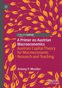 Titel: "A Primer on Austrian Macroeconomics". Gelbes Blättermuster auf magentafarbenem Hintergrund.