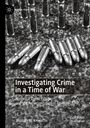 Buchcover mit Patronen. Titel: "Investigating Crime in a Time of War. Historical Crime Fiction and the Representation of Fascism." Von Thomas W. Kniesche. Links oben ein Logo mit Text "CRIME FILES".