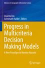 "Progress in Multicriteria Decision Making Models" steht auf blau-gelbem Hintergrund. Logo rechts unten.