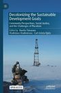 Text: "Decolonizing the Sustainable Development Goals. Community Perspectives, Social Justice, and the Challenges of Pluralism."  
Eine verschneite Landschaft mit einem Schneefahrzeug und einem Turm.