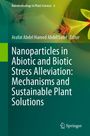 "Nanoparticles in Abiotic and Biotic Stress Alleviation: Mechanisms and Sustainable Plant Solutions" Titel auf grünem Hintergrund.