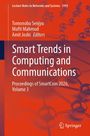 "Smart Trends in Computing and Communications" steht groß auf einem orangefarbenen Hintergrund mit Muster.