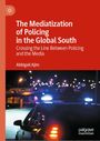 "The Mediatization of Policing in the Global South" von Abbigail Ajim. Polizeiauto bei Nacht, Lichter im Hintergrund.