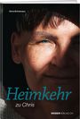 "Heimkehr zu Chris", Chris Brönimann. Ein Gesicht zur Hälfte im Schatten, mit sichtbarem blauem Auge.