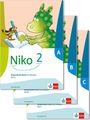 "Niko 2", Grundschrift Arbeitsheft PLUS mit Medien für Teil A, B, C. Illustration: Drache malt mit kleiner Figur.