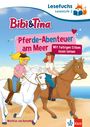 "Pferde-Abenteuer am Meer", "Mit farbigen Silben lesen lernen". Zwei Mädchen reiten am Strand.