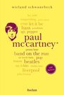 „Paul McCartney“ steht im Zentrum, umgeben von Wörtern wie „Let It Be“, „Beatles“ und „Liverpool“. Reclam unten.