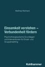 Text: "Matthias Reinhard. Einsamkeit verstehen – Verbundenheit fördern. Psychotherapeutische Grundlagen für Einzel- und Gruppensetting." Unten steht "Kohlhammer". Ein schlichtes Cover mit dunklem Hintergrund.